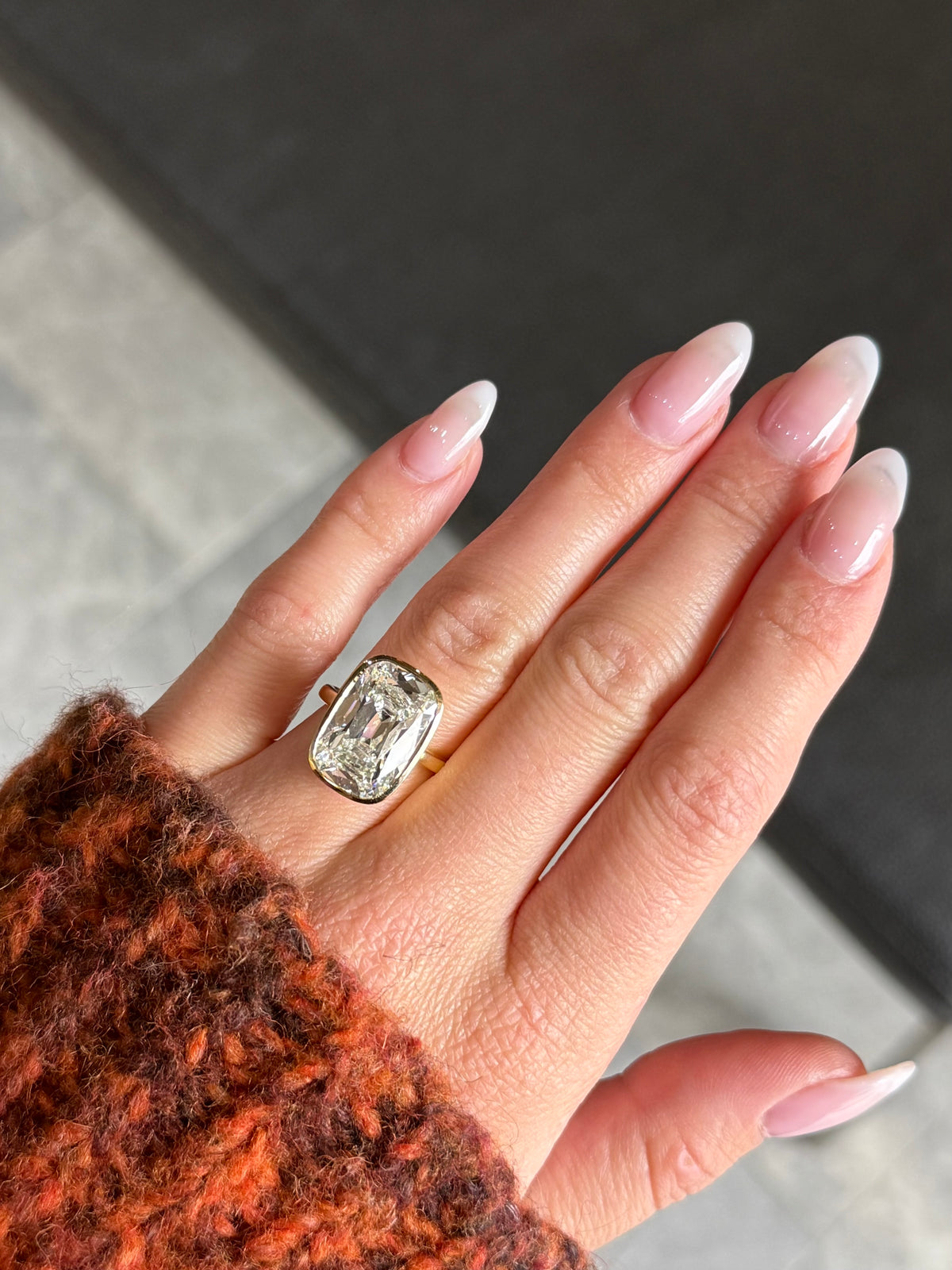 ELONGAED LAB CUSHION CUT DIAMOND BEZEL-SET ENGAGMENT RING